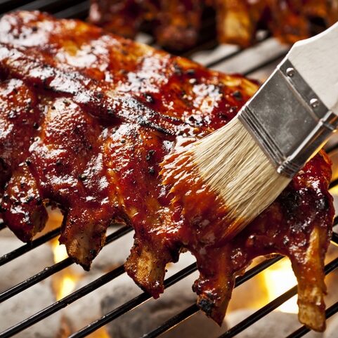 Rack of baby back ribs on the grill.  Please see my portfolio for other food related images.